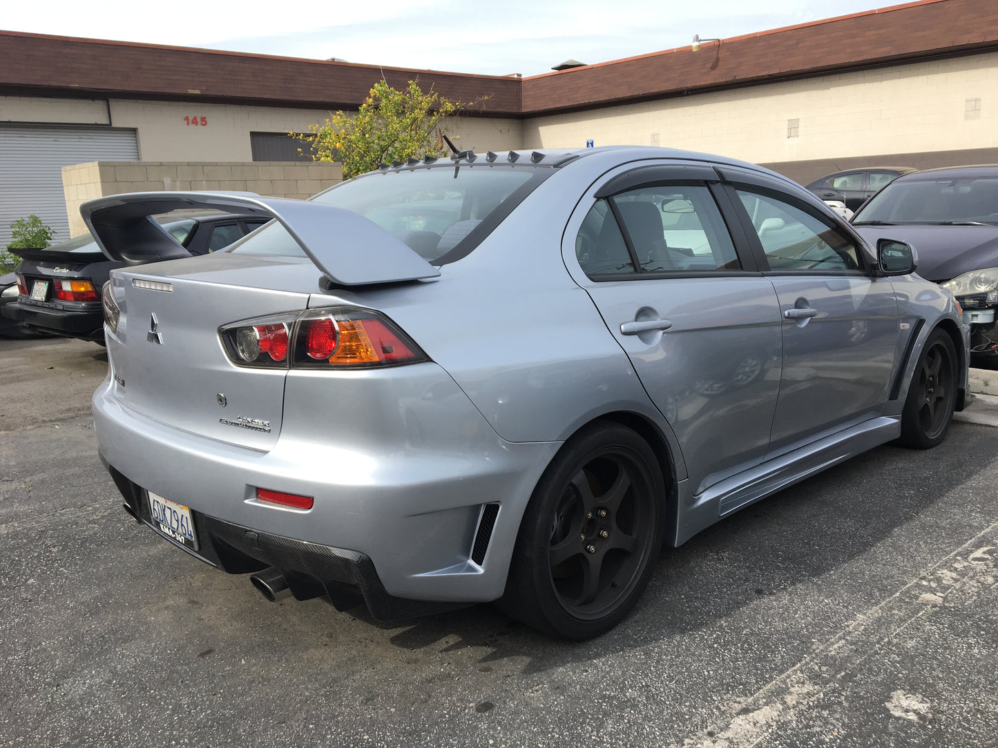 AeroLuxe Evo X Spec-FQ Rear Bumper (FRP)